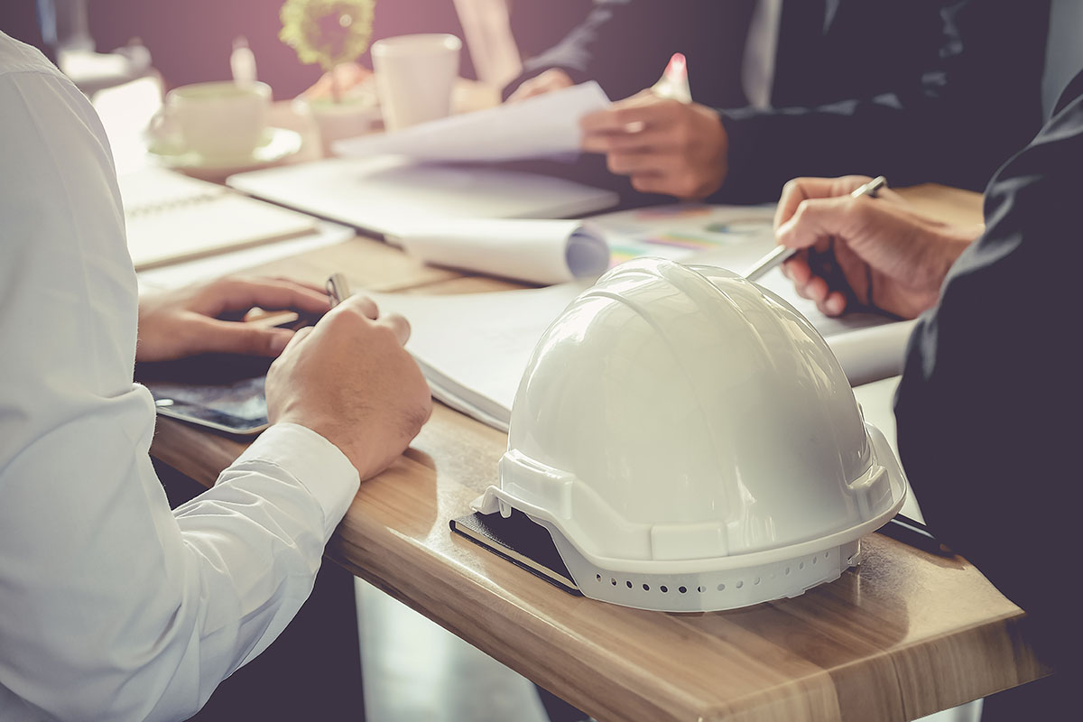 Architect and businessman planning meeting to work with commitme